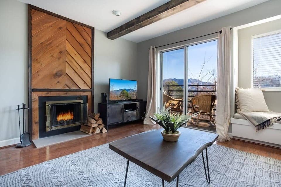 Incredible first floor condo with awesome views of Mt. LeConte and The Great Smoky Mountains National Park!  Wood burning fireplace!