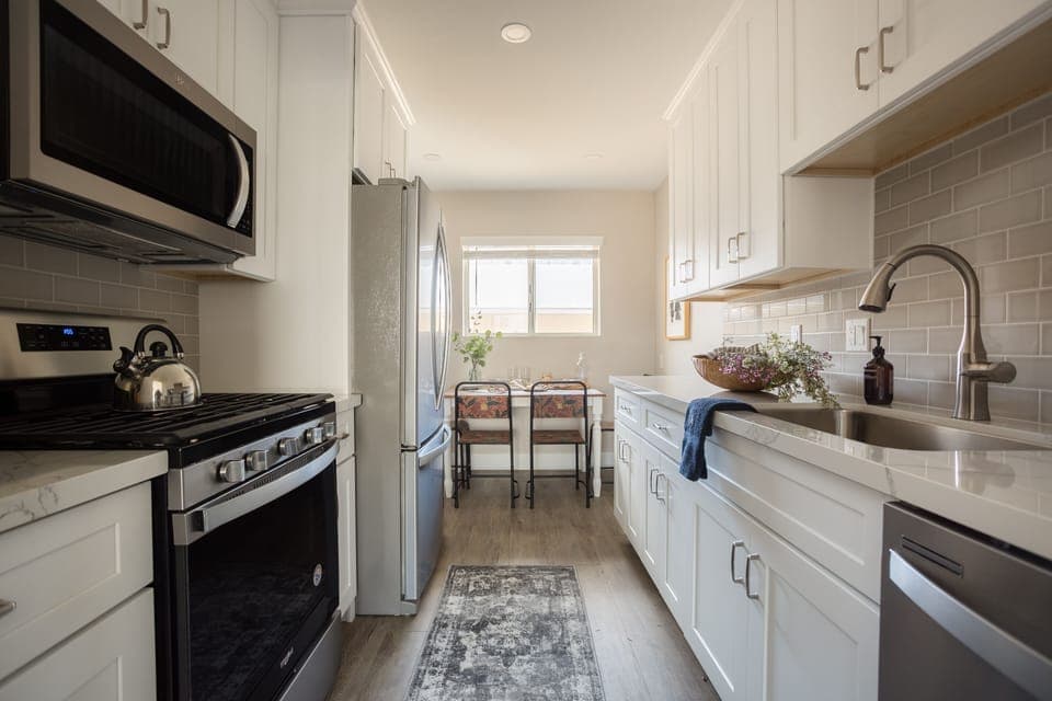 Kitchen features modern appliances.