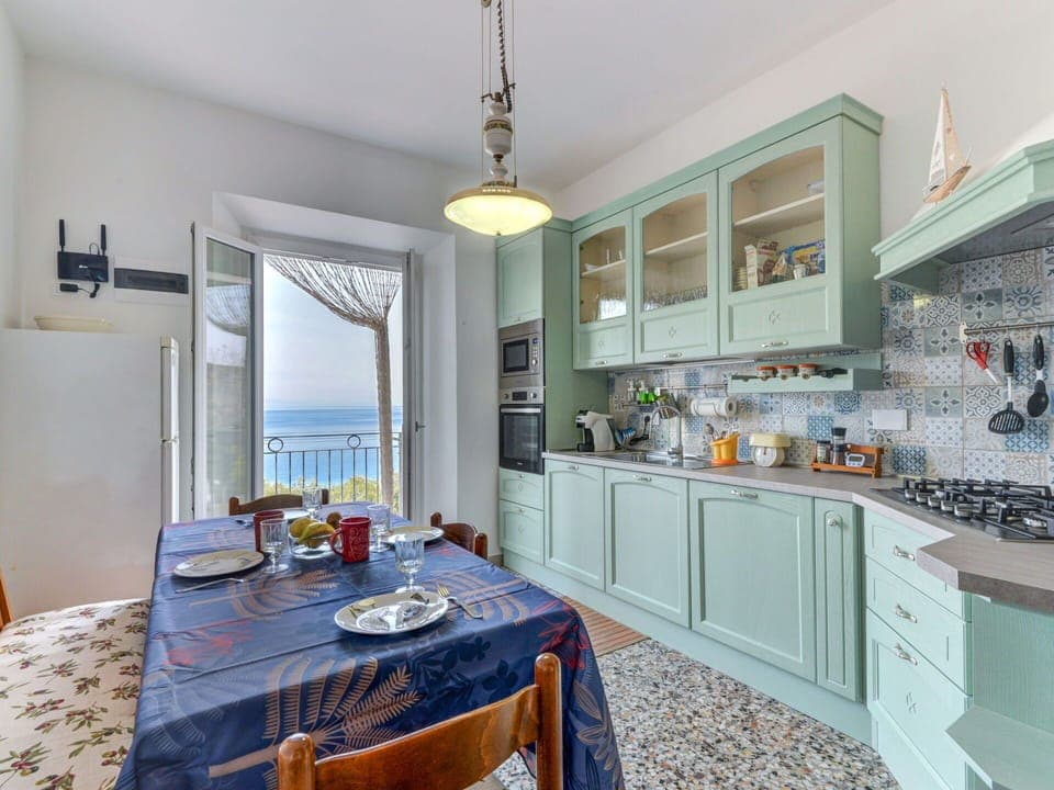 Cabinetry, Table, Furniture, Countertop, Chair, Interior Design, Architecture, Kitchen, Wood, Drawer