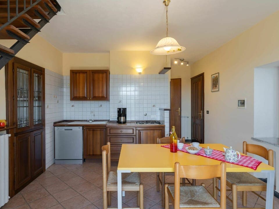 Furniture, Table, Property, Cabinetry, Countertop, Wood, Building, Interior Design, Lighting, Houseplant