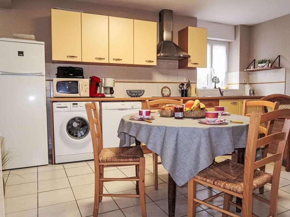 Table, Cabinetry, Kitchen, Gas Stove, Kitchen Appliance, Wood, Kitchen Stove, Cooktop, Interior Design, Countertop