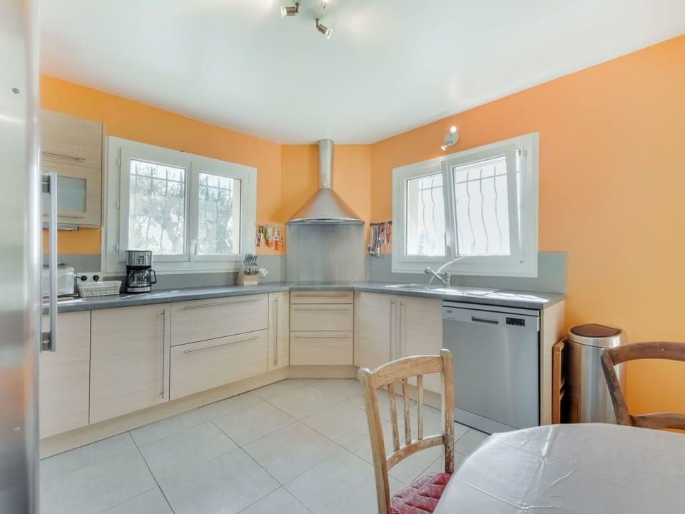 Room, Property, Furniture, Kitchen, Yellow, Floor, Building, Interior Design, Cabinetry, Countertop