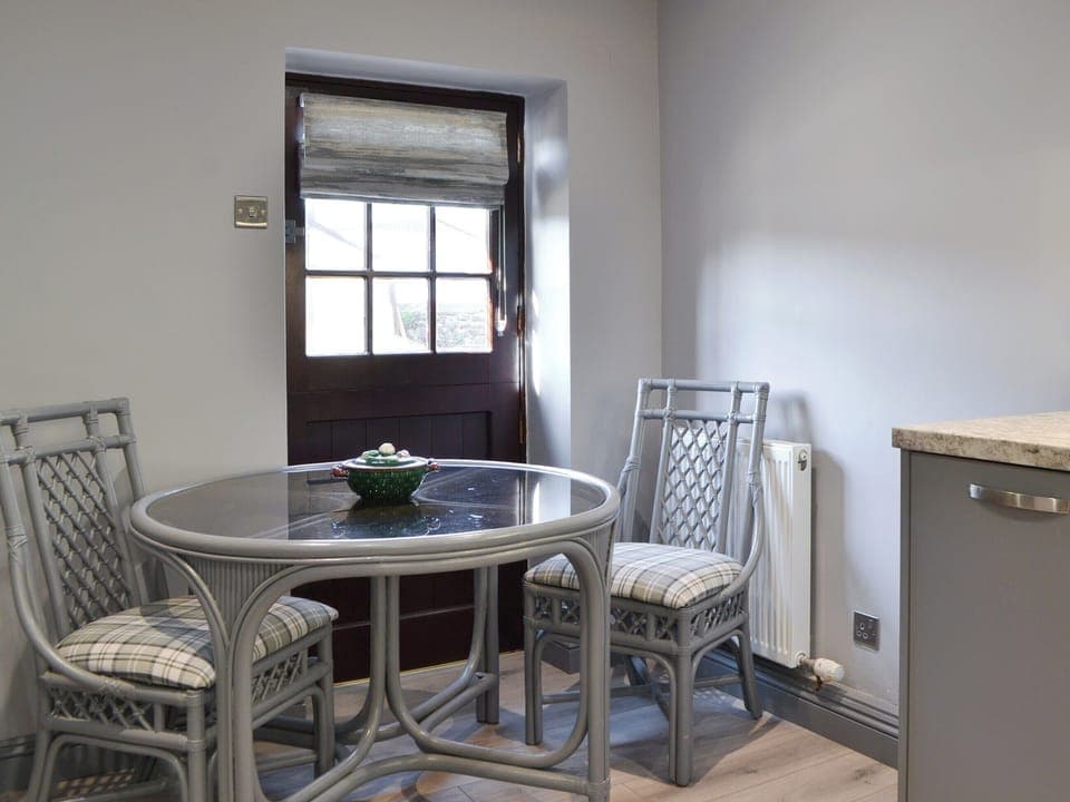 Charming dining area | The Milking Parlour - Stone House Farm Holiday Cottages, St Bees, near Whitehaven