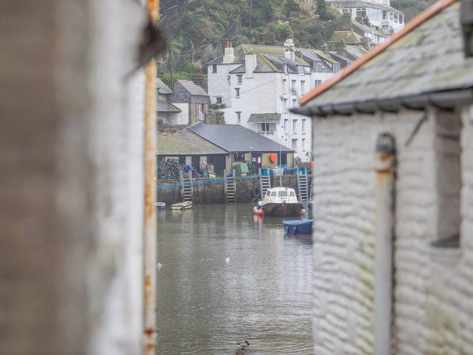 View from property offers a glimpse of the harbour | Talland House, Polperro, near Looe