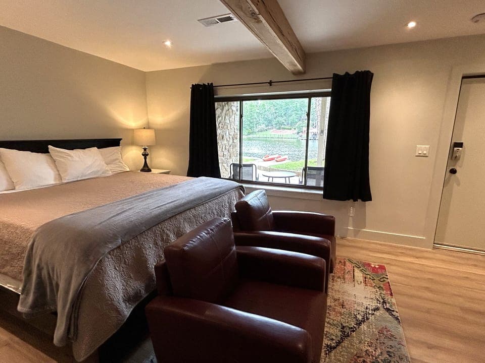 View from downstairs bedroom and door out to patio with bistro set