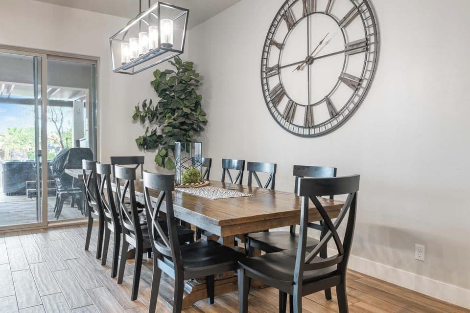 Dining area with seating opens up to covered patio