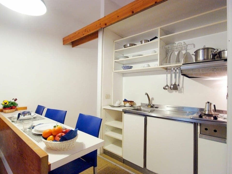 Countertop, Room, Kitchen, Property, Furniture, Cabinetry, Interior Design, Building, Lighting, House