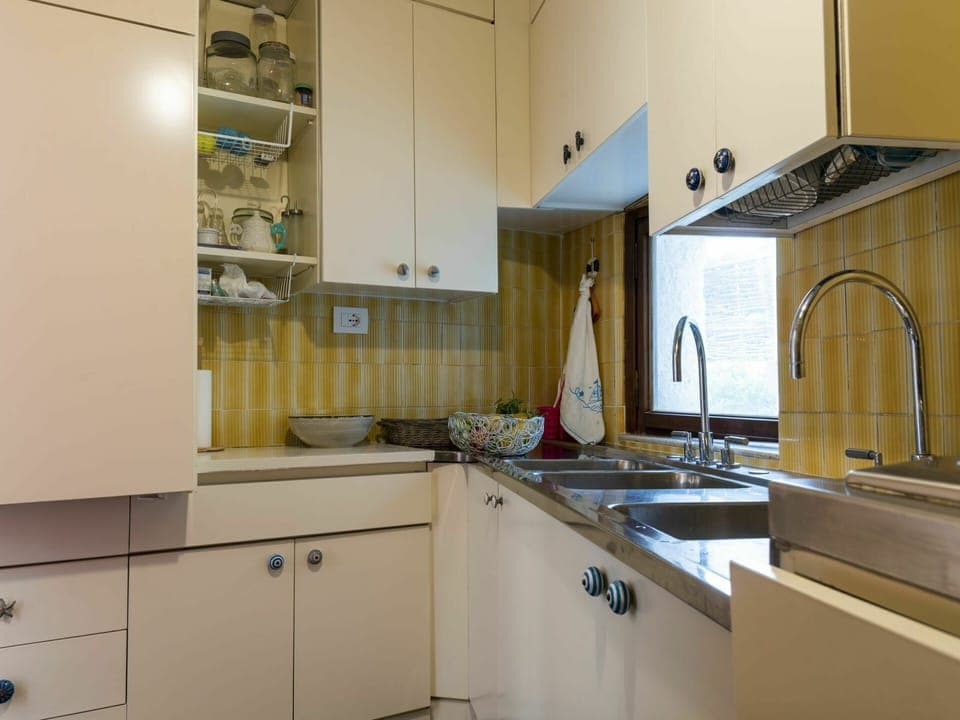 Tap, Cabinetry, Kitchen Sink, Sink, Countertop, Property, Plumbing Fixture, Kitchen, Wood, Kitchen Stove