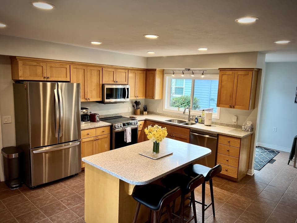 Kitchen with new appliances.  Fully stocked!