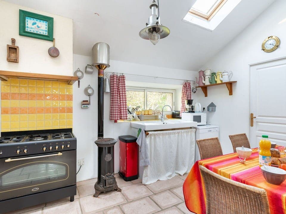 Property, Cabinetry, Table, Picture Frame, Lighting, Interior Design, Kitchen, Wood, Flooring, Countertop