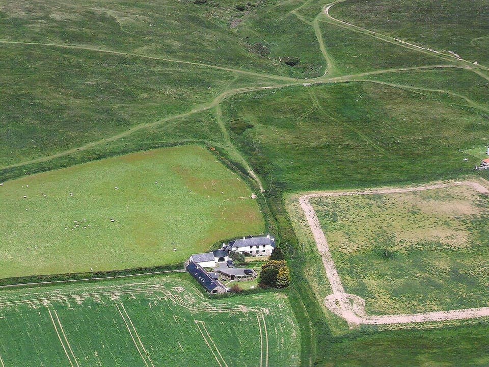 Aerial shot of Lennanick Farm and Cubert Common | The Old Stable, Horseshoe Cottage - Lewannick Farm, Holywell Bay, near Perranp