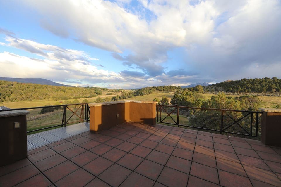 The balcony provides commanding views of the 35 acre property. 