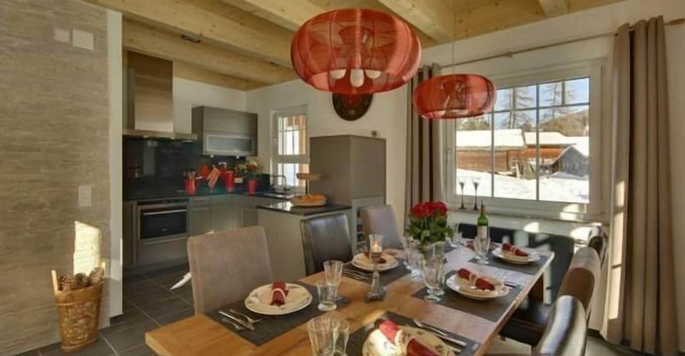 Dining area with a view of the open kitchen