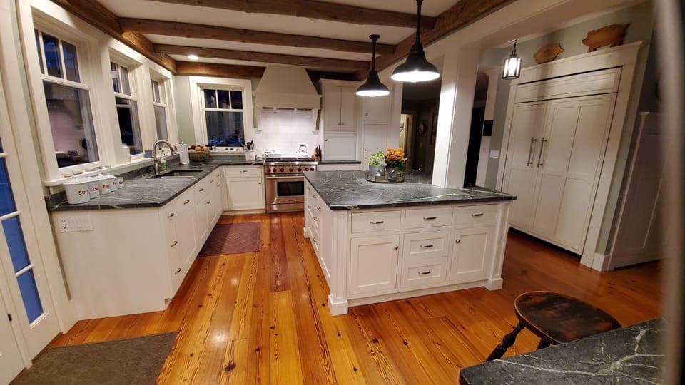 Stove, soapstone island and sub zero fridge.  Ice maker and wine/bev fridges.