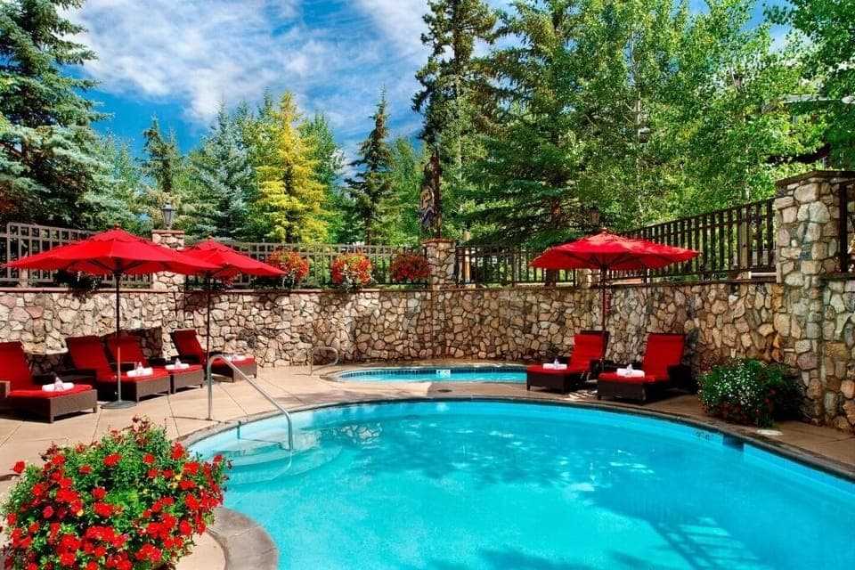Hotel pool/hot tub with inside entrance to pool (swim under glass in winter)