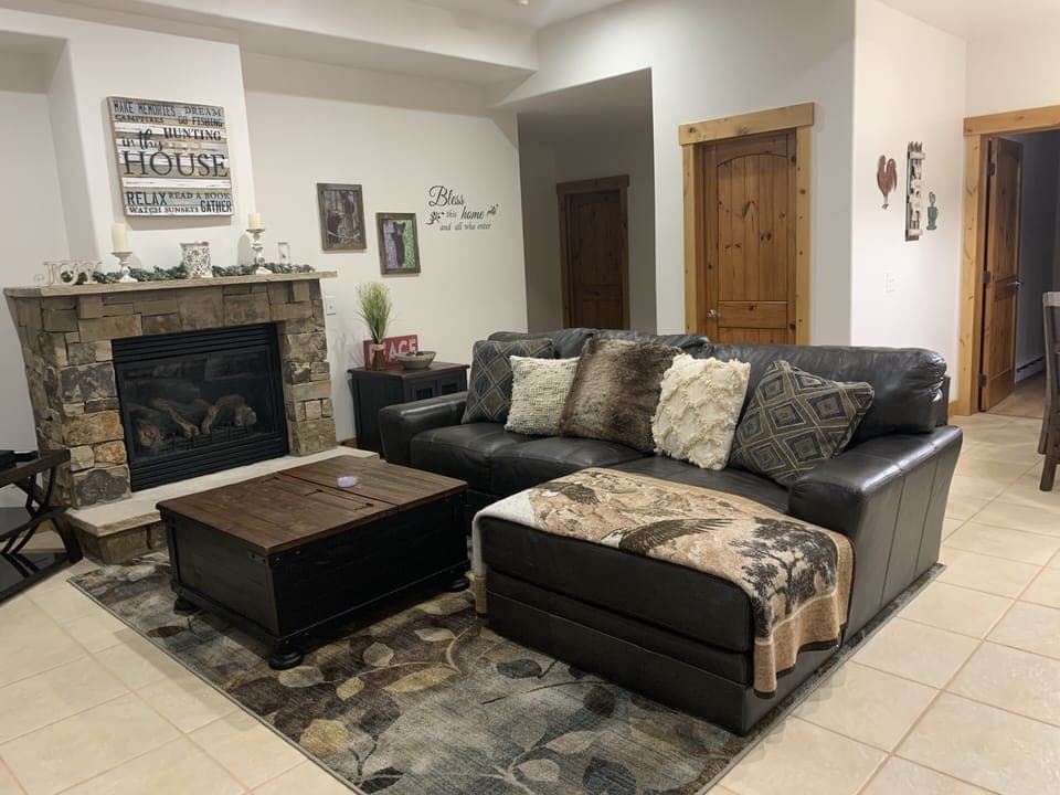 Living room with gas fireplace. 