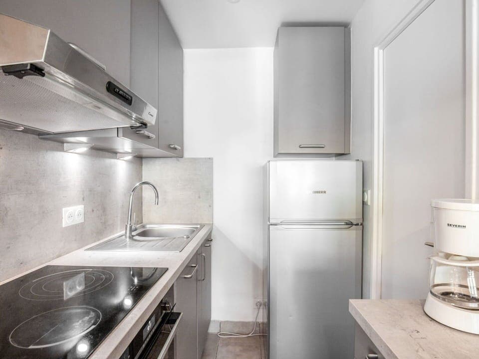 Property, Room, Interior Design, Architecture, Kitchen, House, Countertop, Floor, Major Appliance, Cabinetry