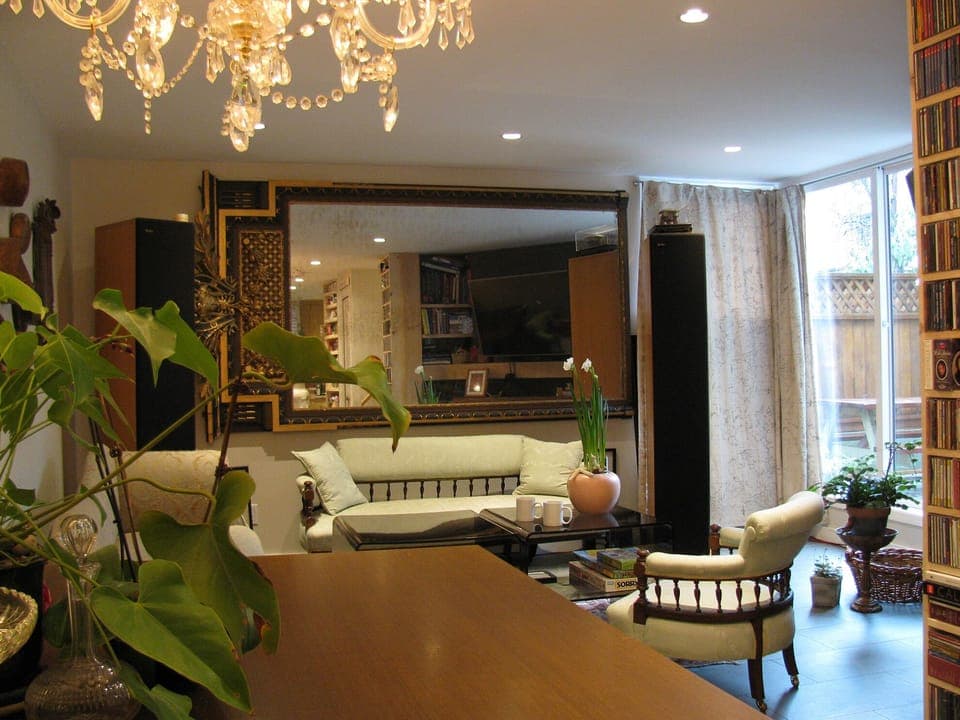 Dining room faces cozy living room and patio door