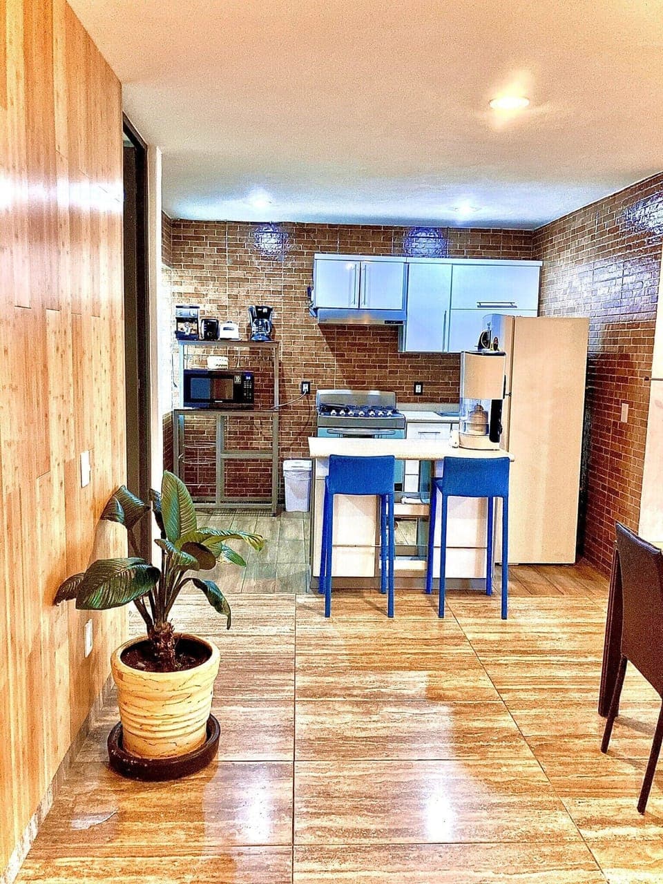 Amplia cocina integral equipada con todo lo necesario siéntete como en Casa!