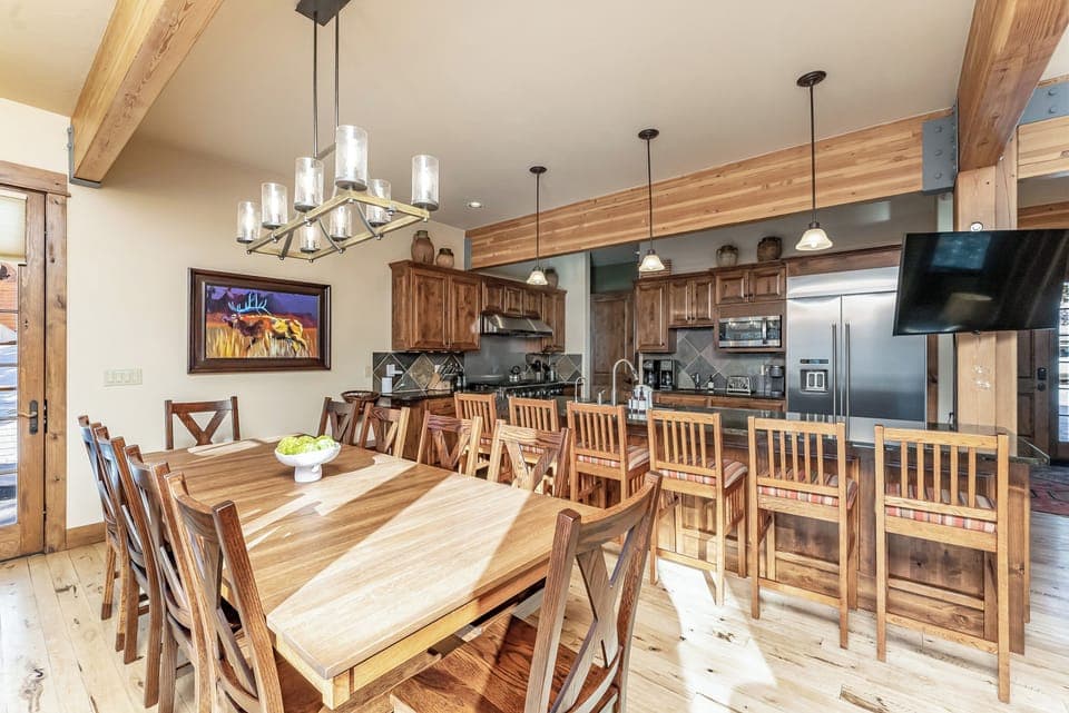 Formal dining area with additional barstool seating for up to 6 guests