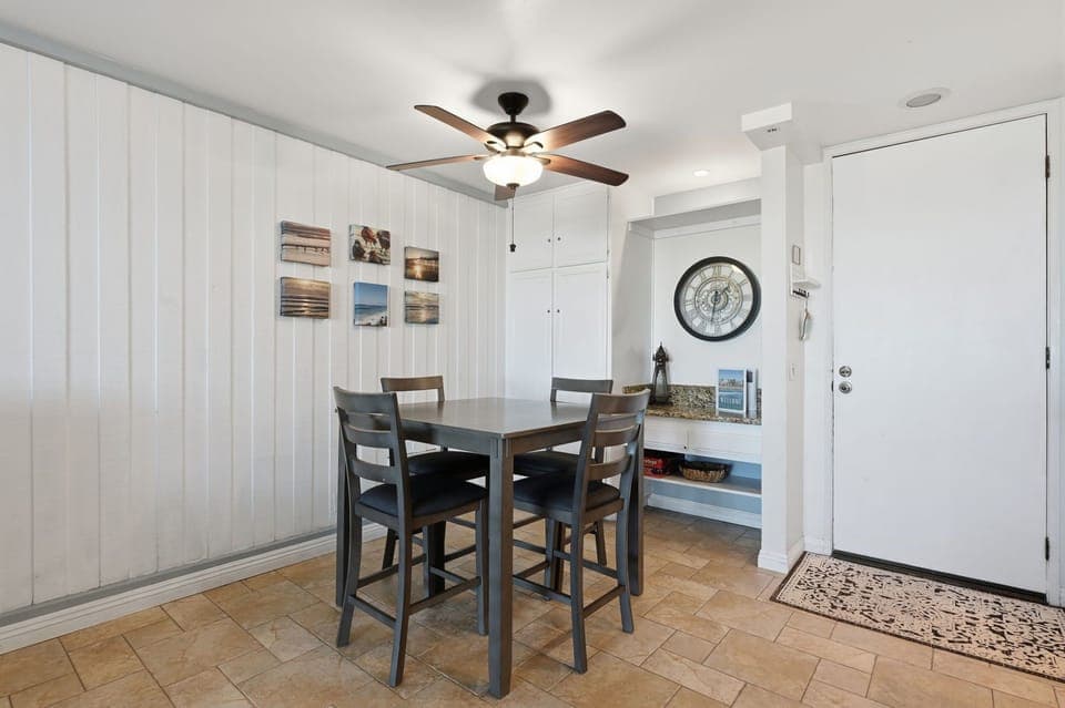 Dining table for all guests to enjoy family dinners or game nights.