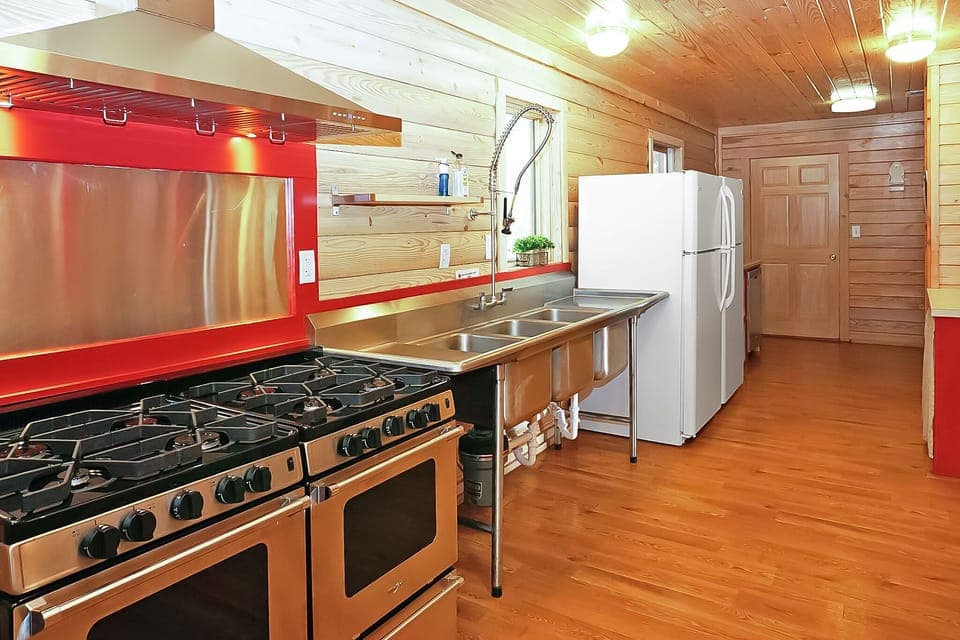 Commercial kitchen with two gas ranges