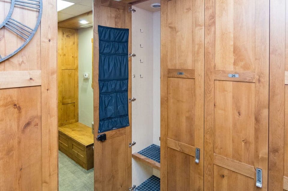 Ski locker room with private locker for guest use