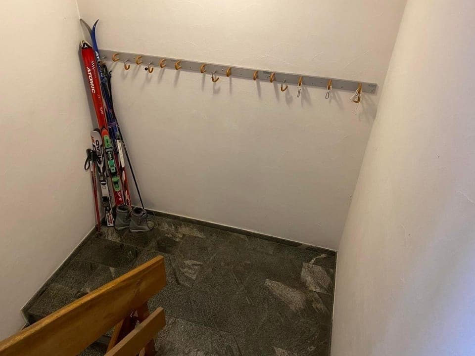 The ski storage area in the stairwell