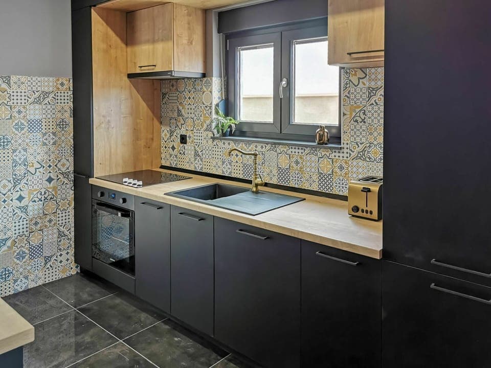 Countertop, Cabinetry, Building, Kitchen Stove, Kitchen, Window, Sink, Kitchen Appliance, Tap, Wood