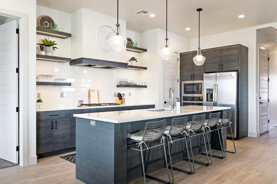 Spacious kitchen stocked with utensils and appliances for cooking