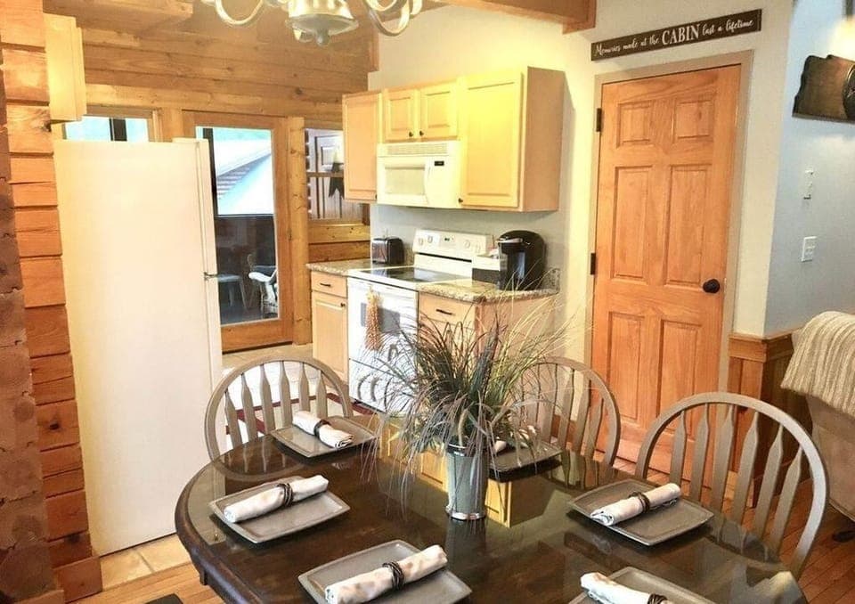 Dinning area features a bench and four chairs
