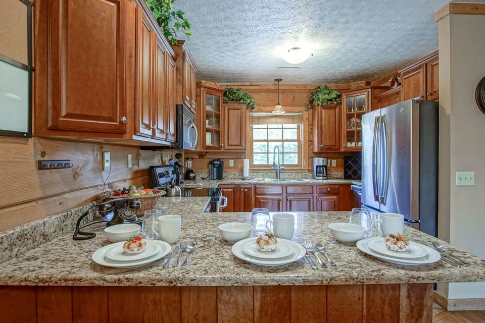 The kitchen has seating for 3 and is located on the 2nd floor.