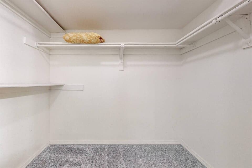 Extra closet space located in king bedroom