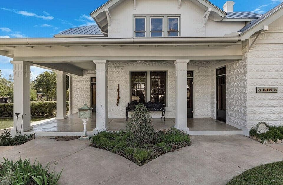  Basse Block home showing the llarge covered front porch
