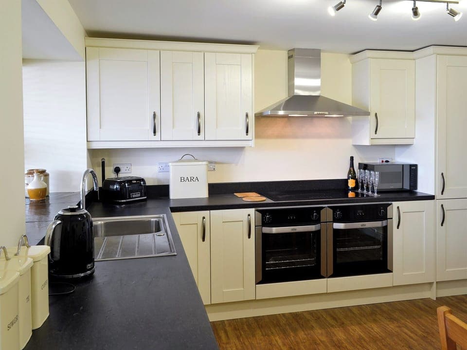 Kitchen and dining area | Tyddyn Eli, Llangwm, near Corwen