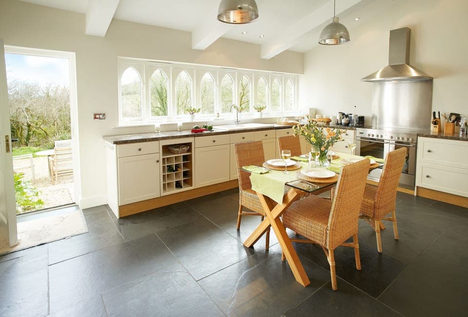 Spacious and fully equipped kitchen and dining table seating four guests