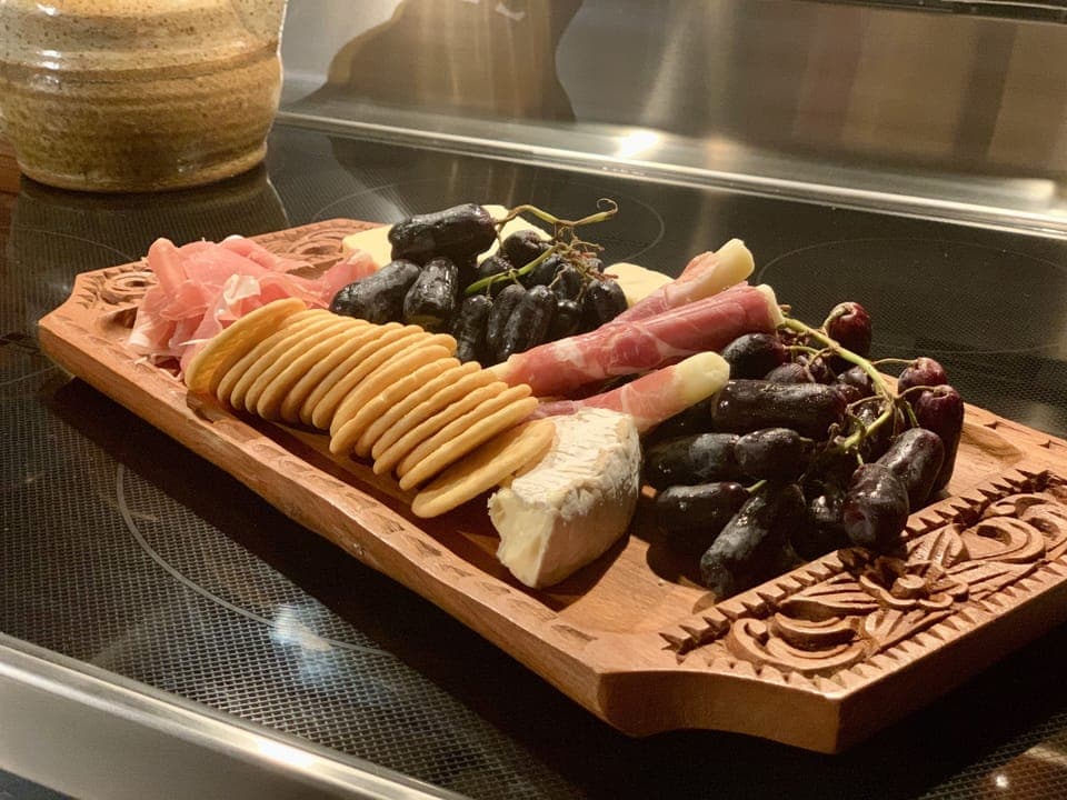 Enjoy a cheese tray outside by the fire!