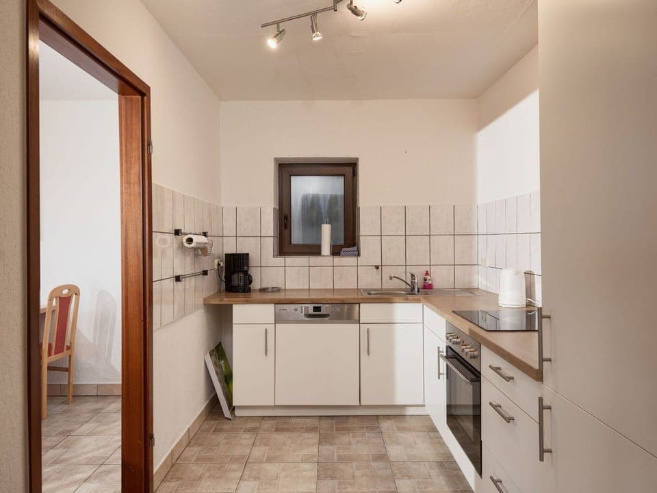 Cabinetry, Sink, Countertop, Property, Furniture, Tap, Kitchen Sink, Wood, Ceiling Fan, Lighting