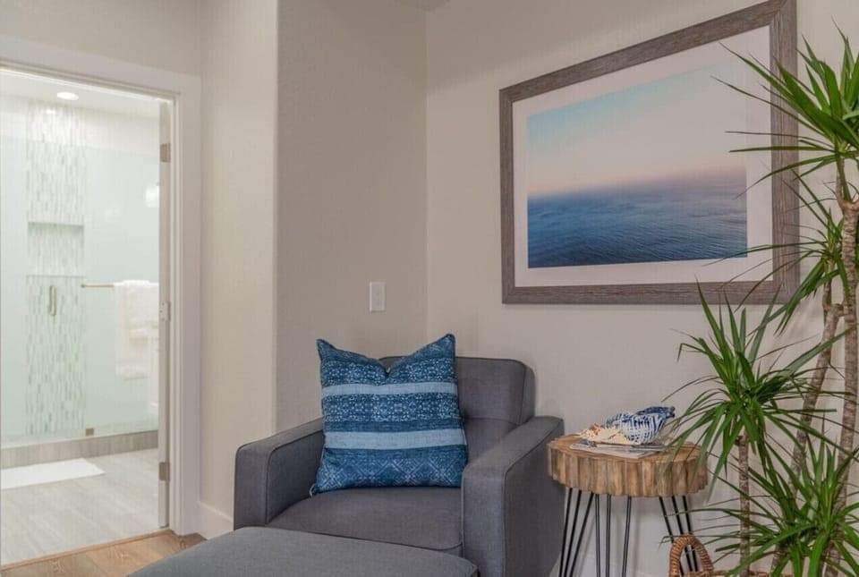 Large Master Bedroom with Queen bed, Smart TV and private balcony.