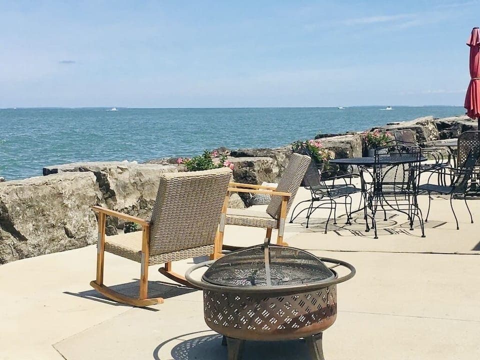 Enjoy the lake front patio with lots of seating for your group.