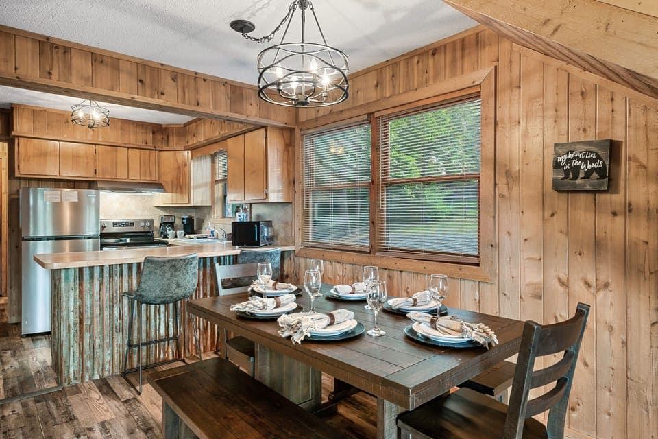 6 seats at the dining room table, and 2 chairs at the kitchen counter.
