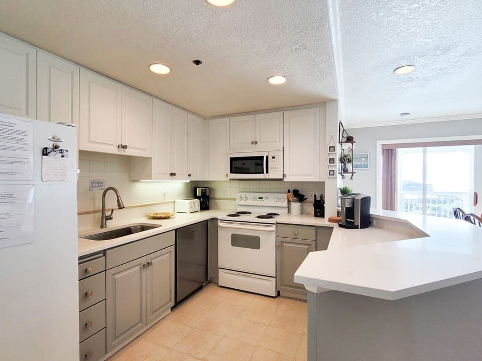 Newly renovated kitchen with quartz counters