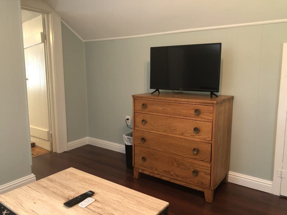 The upstairs sitting area has a TV with Wifi access to stream from your accounts