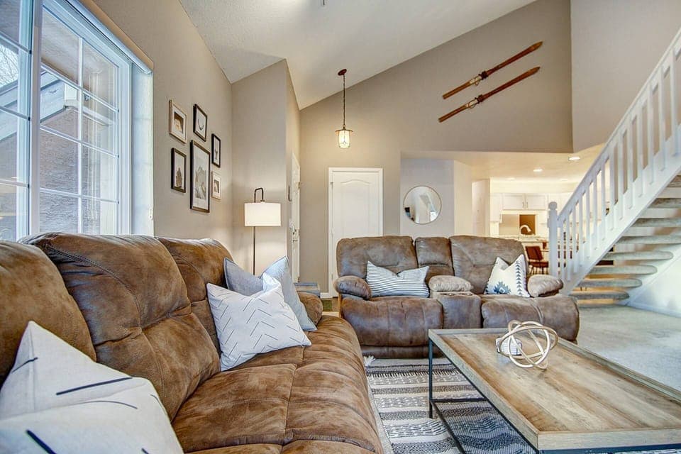 Our living area features impressive vaulted ceilings that create a bright, airy, and expansive feel