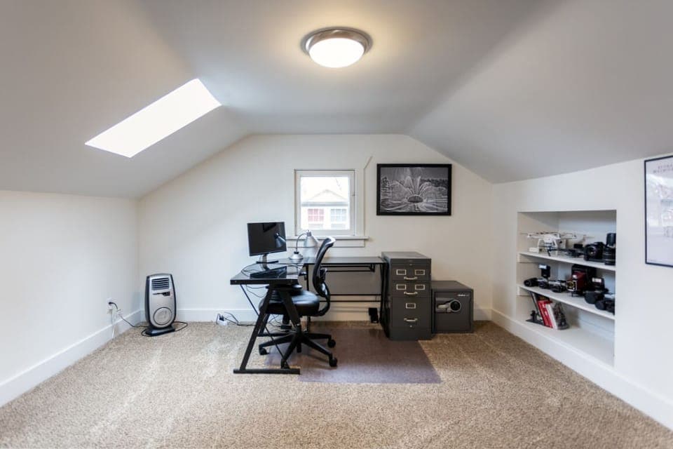 Large Upstairs Bedroom: Office Setup on one side