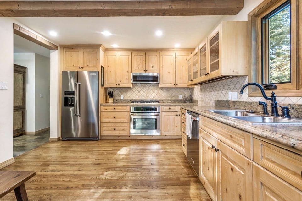 Gorgeous granite countertops provide plenty of workspace for the chef.