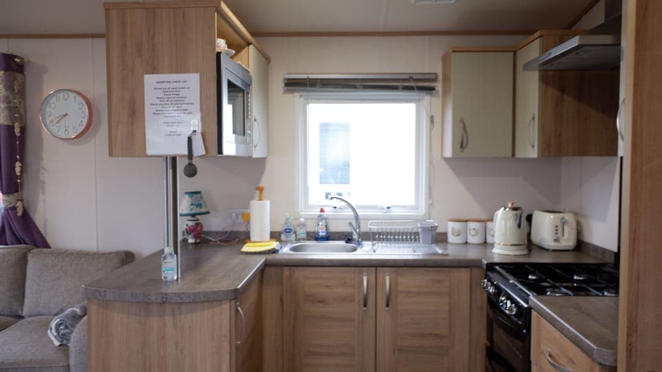 Fully equipped kitchen. Full size cooker. Microwave. Cupboard space.