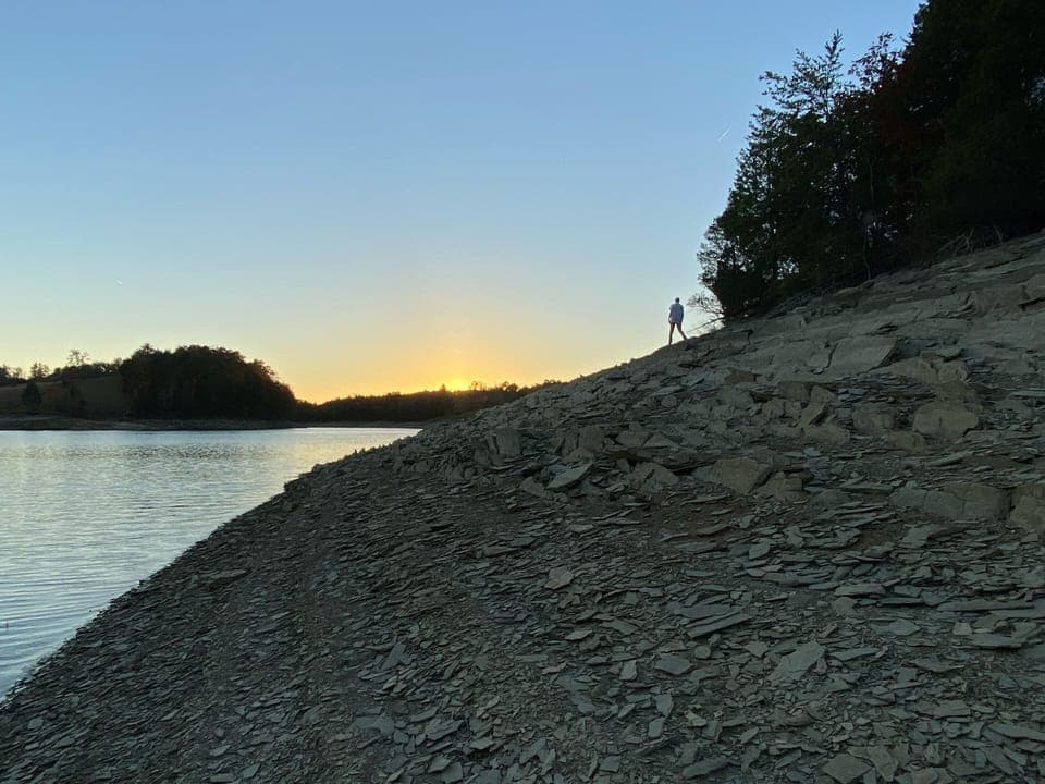 Watching the sun set from the end of the point in fall months.