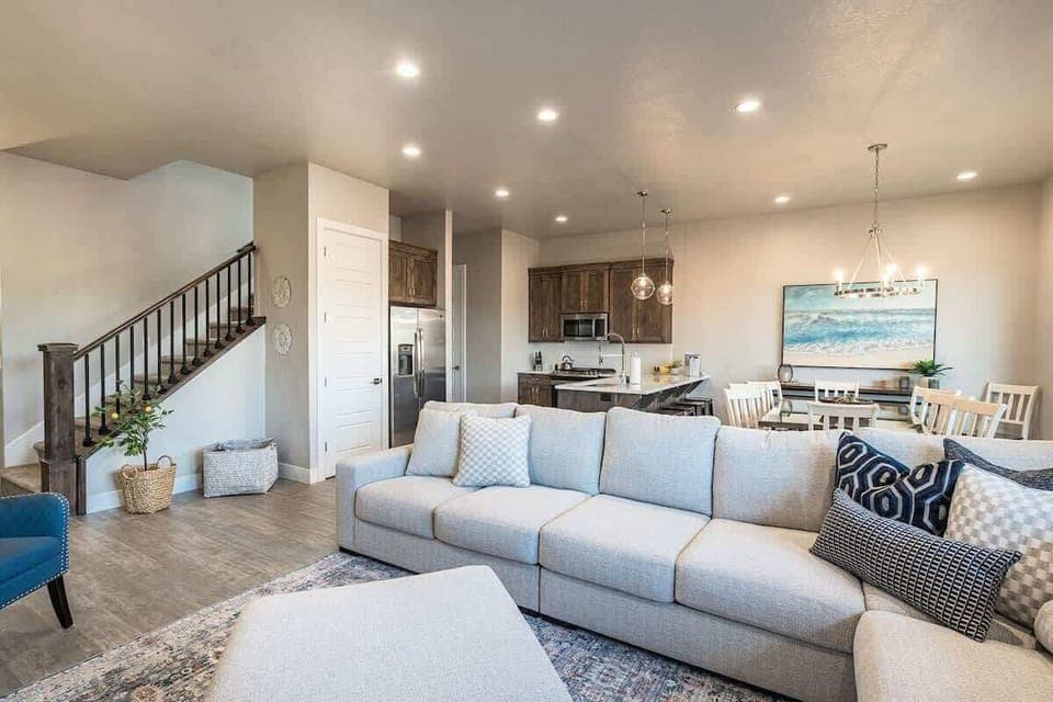 Open concept floor plan open to kitchen and dining area