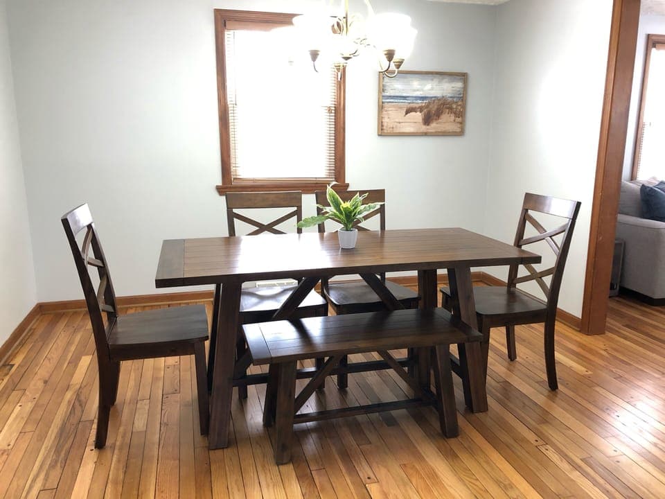 Dining room table seats 6 guests comfortably. 